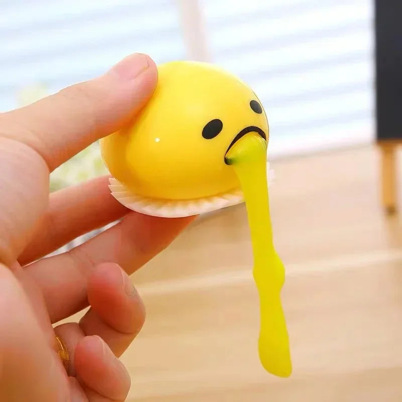 Huevómitos! - 2 unidades con slime en forma y color de yema, juego antiestrés