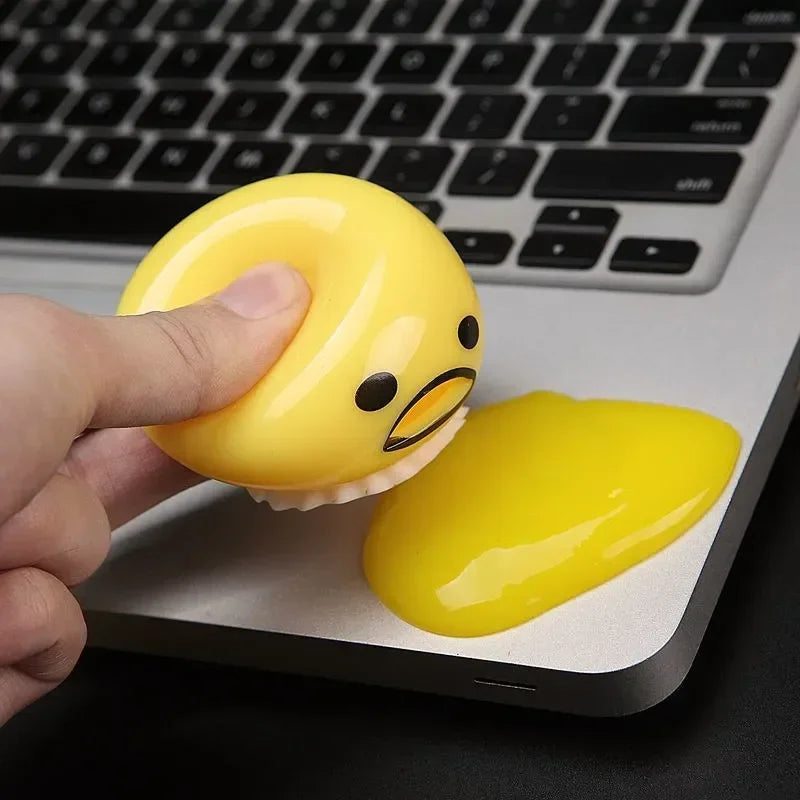 Huevómitos! - 2 unidades con slime en forma y color de yema, juego antiestrés
