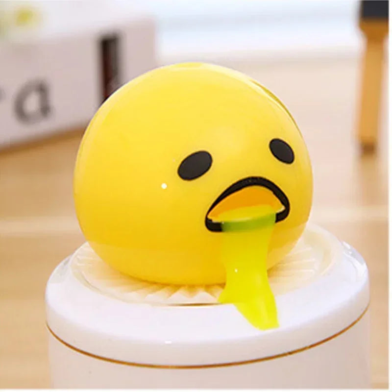 Huevómitos! - 2 unidades con slime en forma y color de yema, juego antiestrés