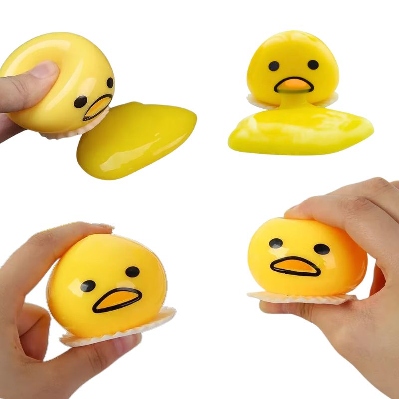 Egg Vomits! - 2 units with slime in the shape and color of yolk, anti-stress game